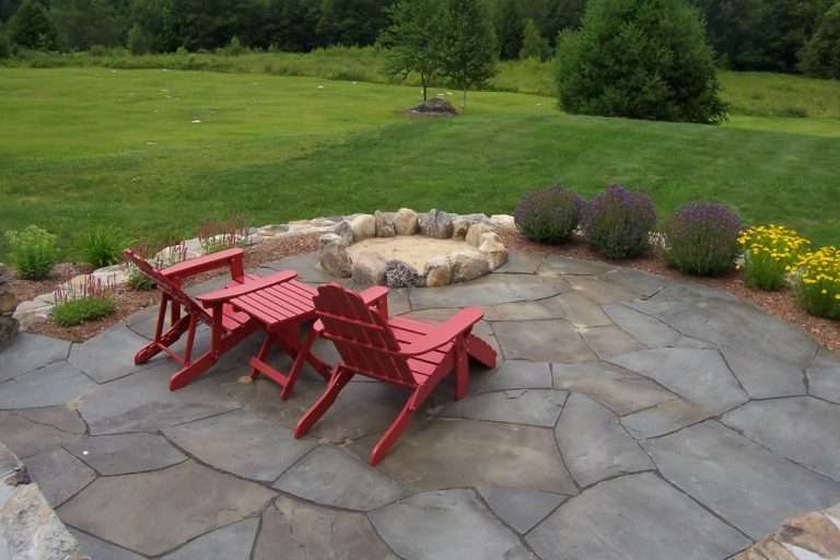 Most requested landscaping features for New Hampshire homeowners including custom patios, fire pits, retaining walls, outdoor kitchens, walkways, garden plantings, and complete outdoor living space design by Landscapes by Tom