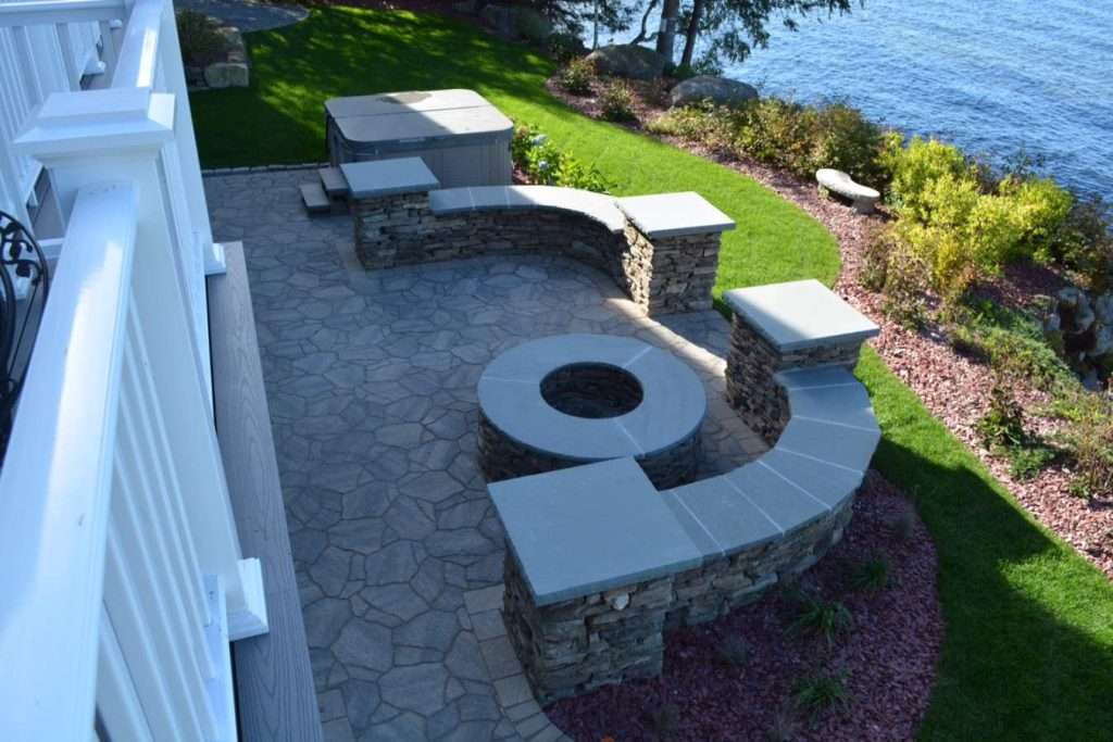 patio with stone walls and granite caps